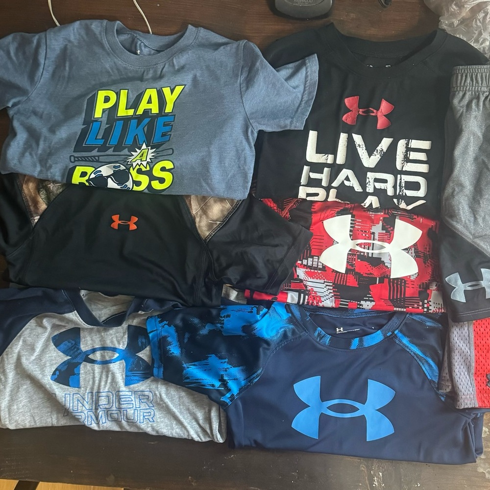 (6) Under Armour Shirts (2) UA shorts size youth 7 lot.